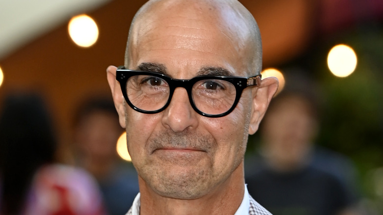 Stanley Tucci smiling at an event