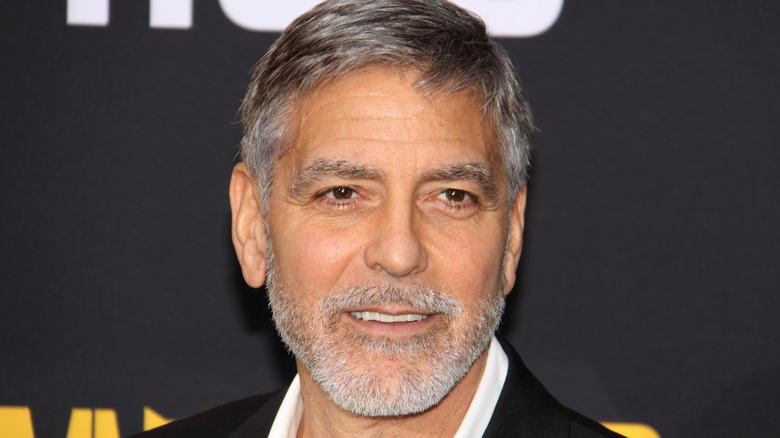 George Clooney smirks