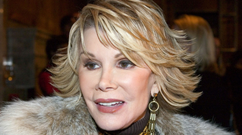 Joan Rivers looking off to the side