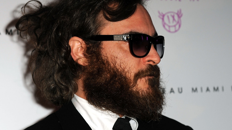 Joaquin Phoenix wearing sunglasses