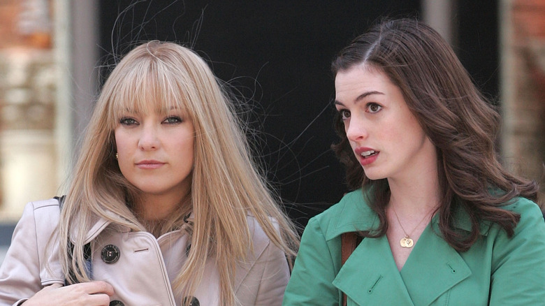 Kate Hudson and Anne Hathaway outside