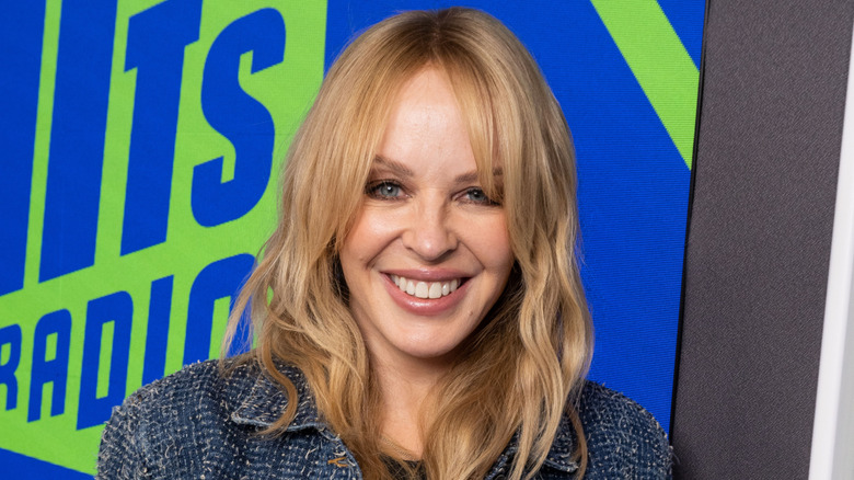 Kylie Minogue smiling broadly at Hits Radio at The Lantern in London in 2024