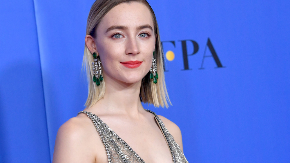 Saoirse Ronan wearing a silver dress