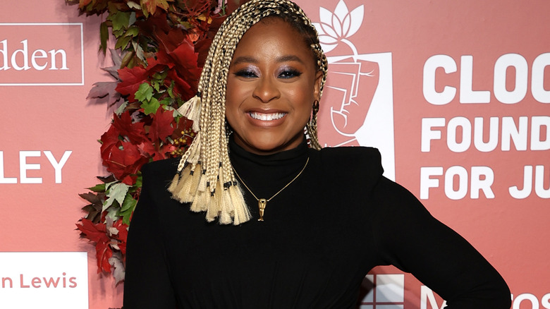 Phoebe Robinson wearing blonde braids