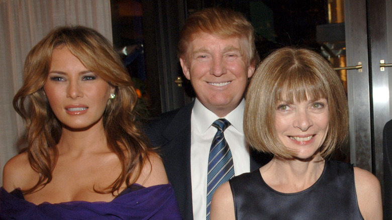 Donald Trump behind Melania Trump, Anna Wintour