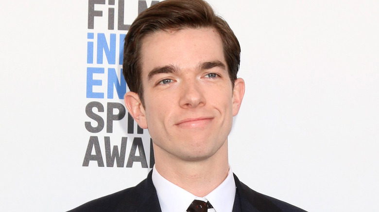 John Mulaney wearing a tie