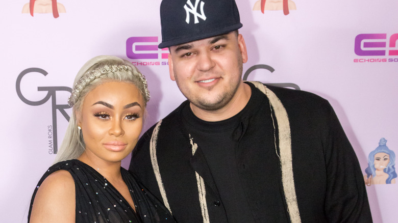 Blac Chyna posing with Rob Kardashian