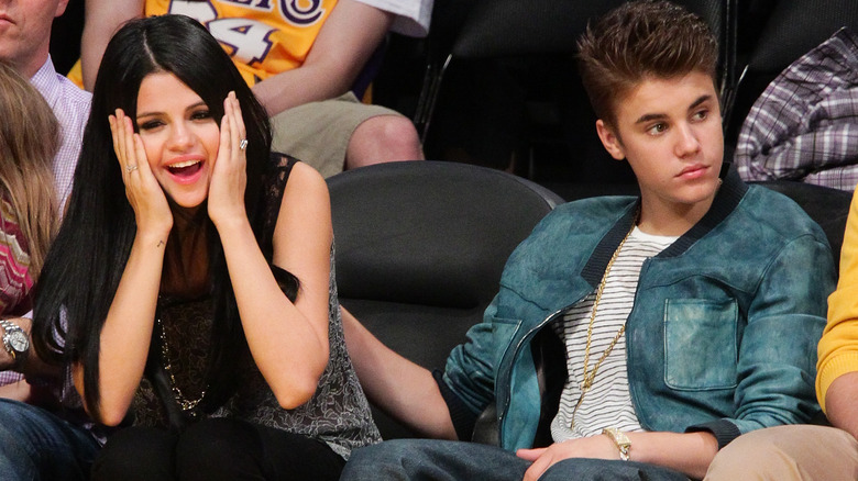Selena Gomez looking shocked with Justin Bieber