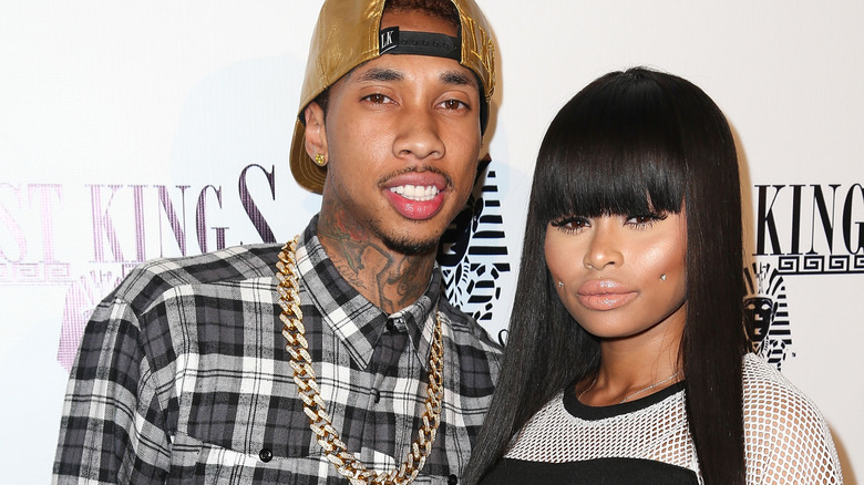 Tyga smiling with Blac Chyna