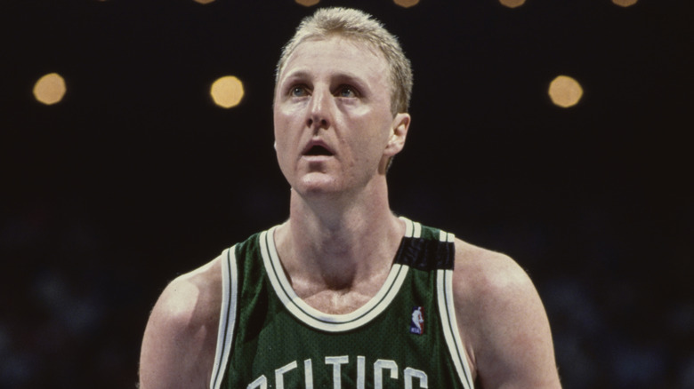 Larry Bird playing basketball