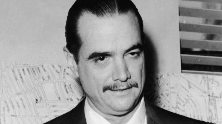 Howard Hughes frowning 