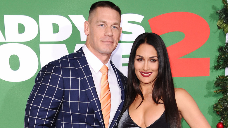 John Cena and Nikki Bella posing