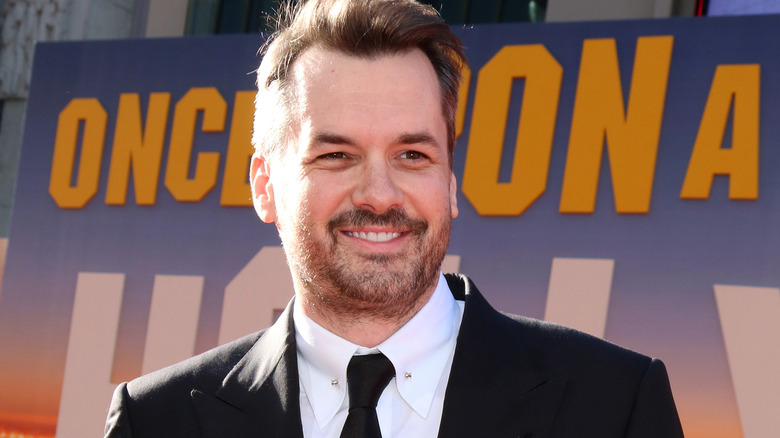 Jim Jeffries smiling in suit