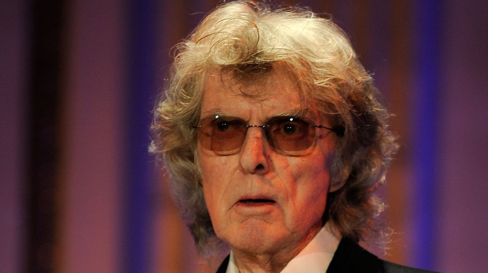 Don Imus wearing glasses, mouth open