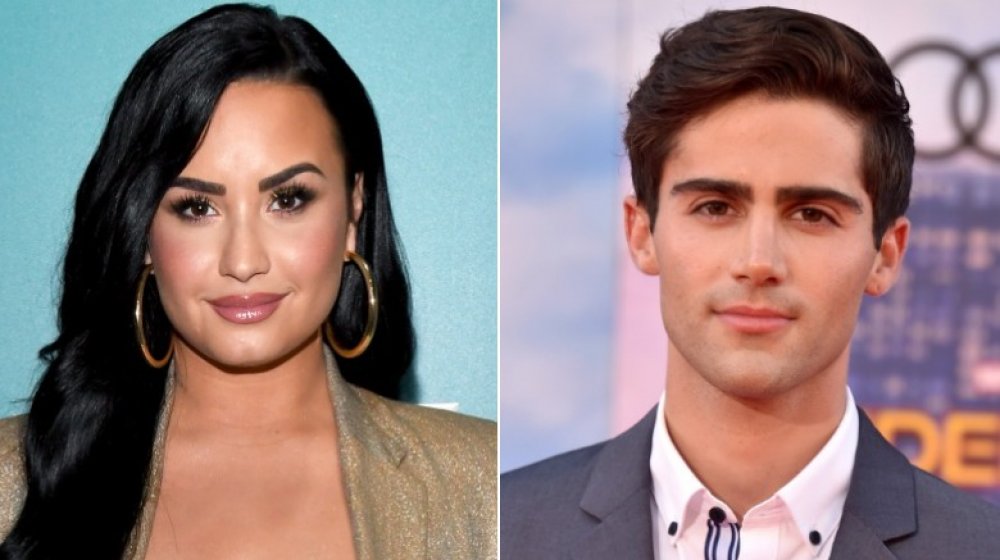 Demi Lovato and Max Ehrich smiling