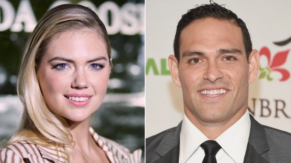 Kate Upton and Mark Sanchez smiling ahead