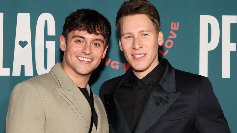 Tom Daley and Dustin Lance Black smiling 