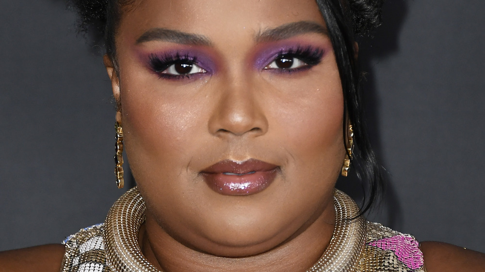 Lizzo smirking 