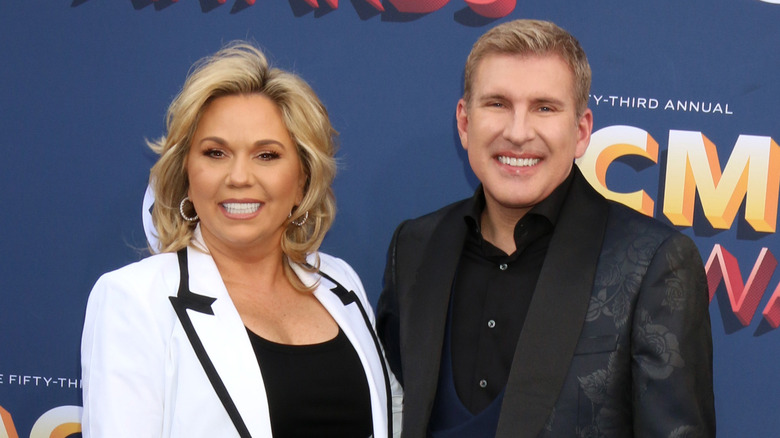 Todd and Julie Chrisley smiling at the 2018 ACM Awards