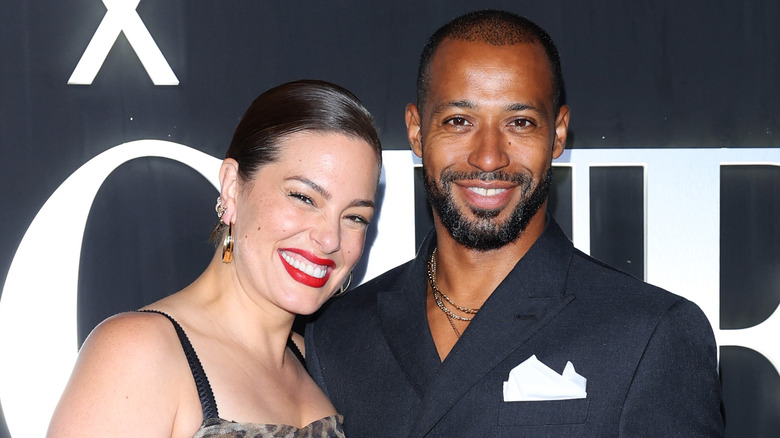 Ashley Graham smiling with Justin Ervin