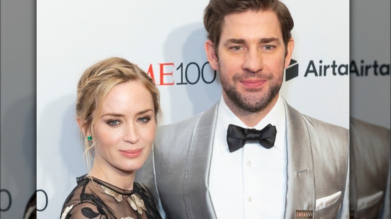 Emily Blunt posing with John Krasinski