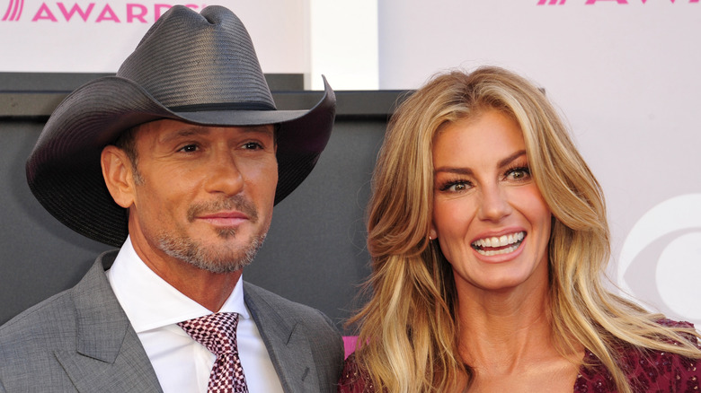 Faith Hill posing with Tim McGraw