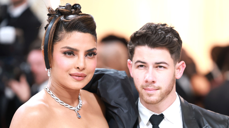 Priyanka Chopra Jonas posing with Nick Jonas