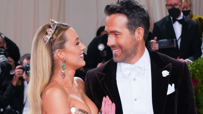 Blake Lively smiling at Ryan Reynolds