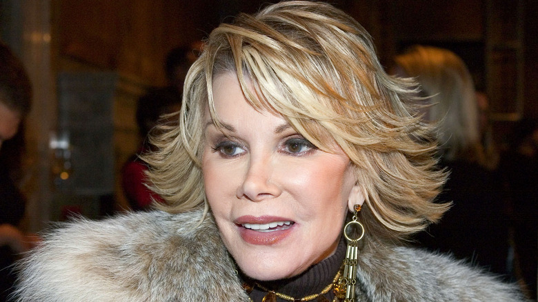 Joan Rivers looking to the side