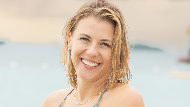 Jodie Sweetin wearing green dress at beach