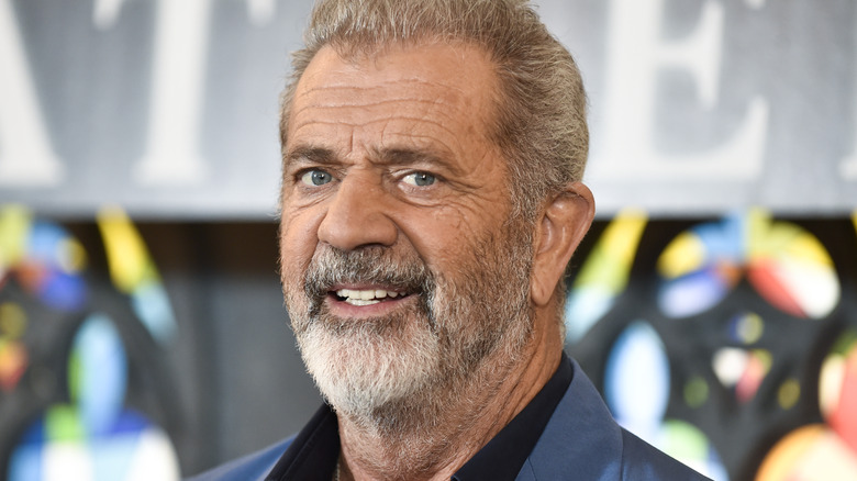 Mel Gibson smiling in full beard