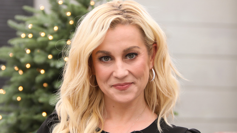 Kellie Pickler in front of Christmas tree