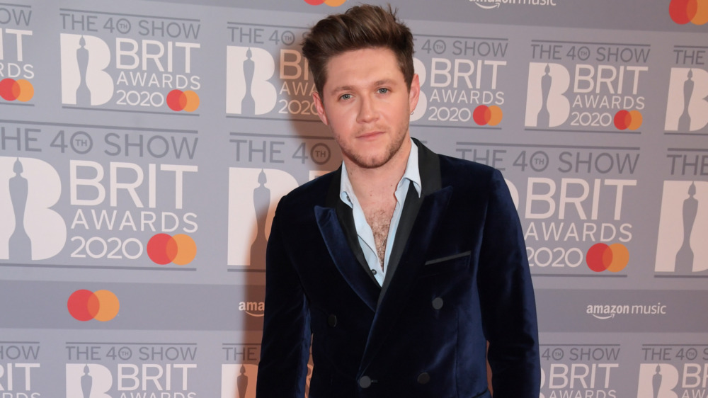 Niall Horan Brit Awards red carpet blue jacket