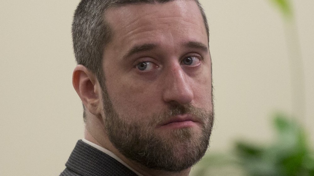 Dustin Diamond sharing a somber look over his shoulder