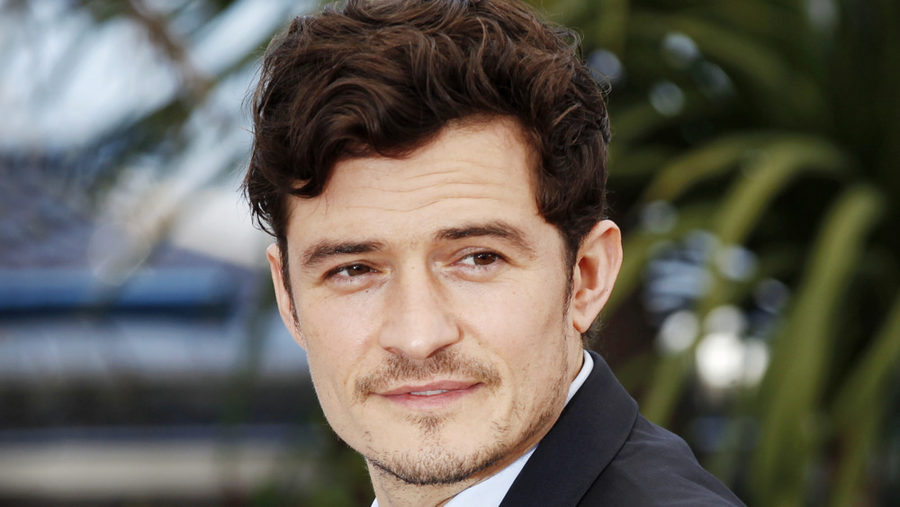 Orlando Bloom smirking