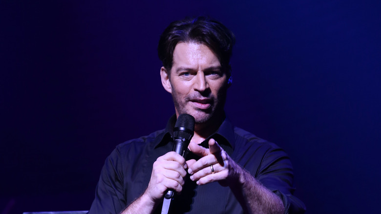 Harry Connick Jr. holding microphone