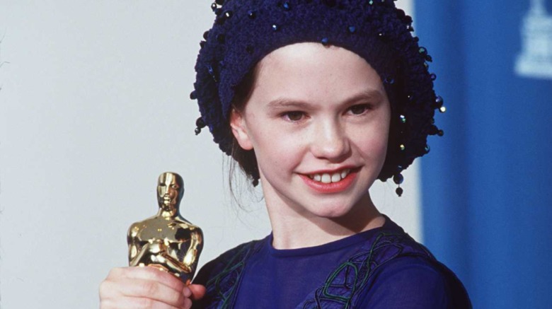 Anna Paquin holding her Oscar