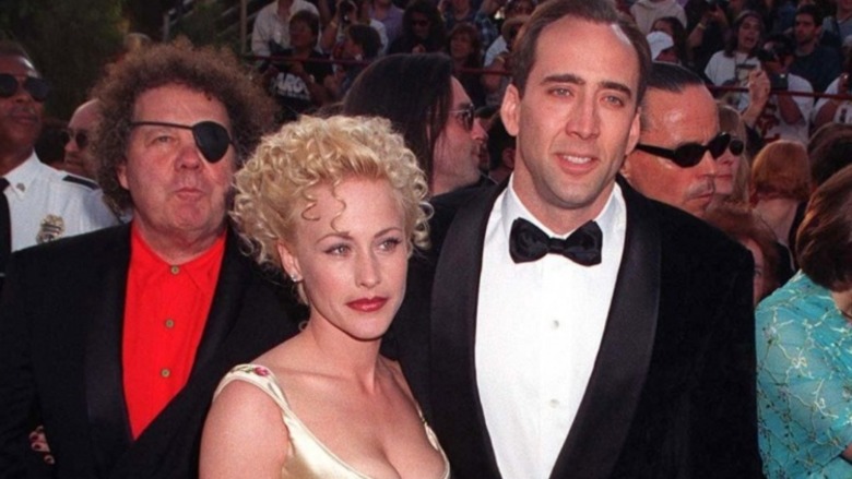 Patricia Arquette and Nicolas Cage posing