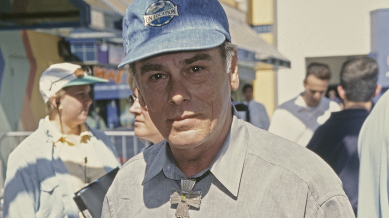 Dean Stockwell wearing blue hat