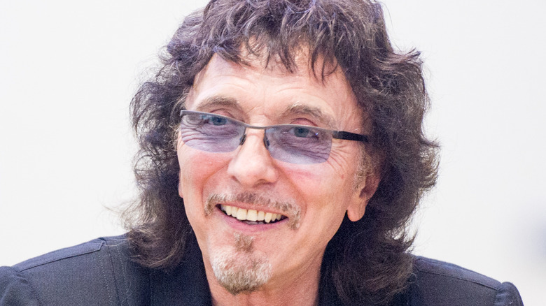 Tony Iommi smiling at an event