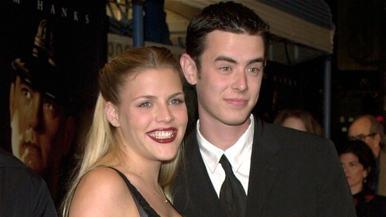 Busy Philipps and Colin Hanks smiling