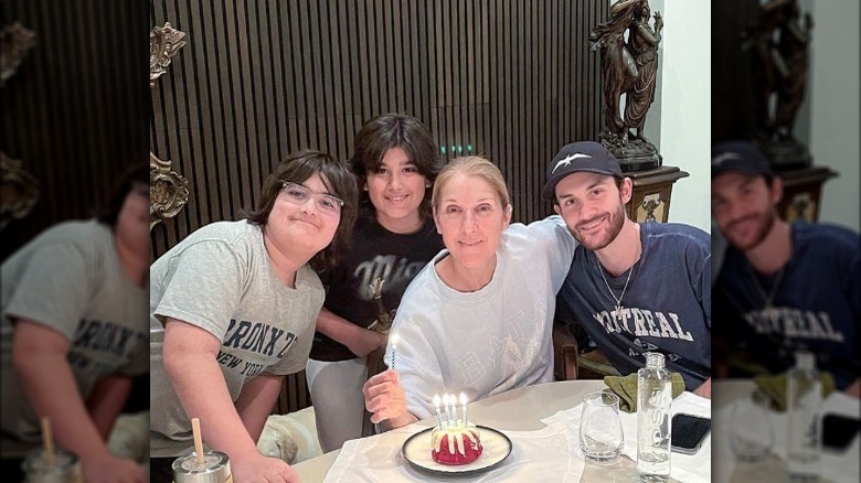 Celine Dion smiling with her sons