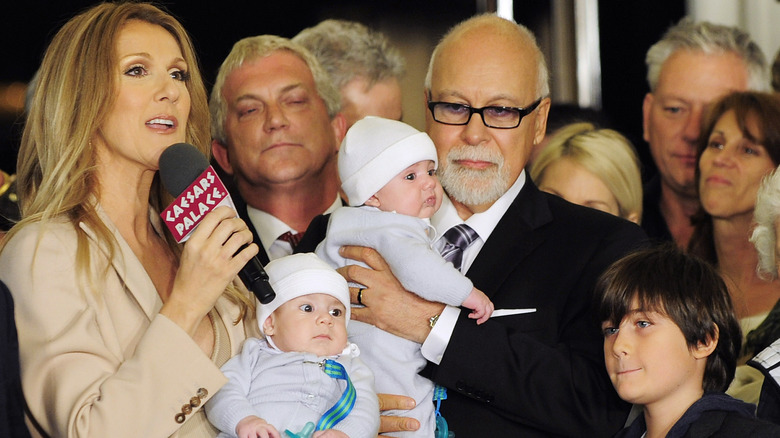 Celion Dion speaking alongside Rene-Charles, Eddy and Nelson, and Rene Angelil