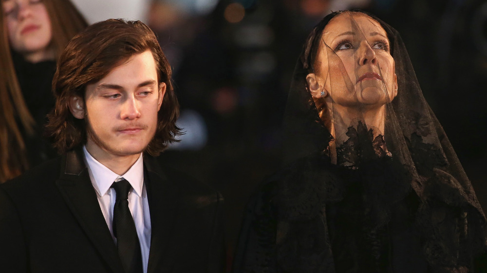 Celine Dion and and René-Charles Angélil attending René Angélil's funeral