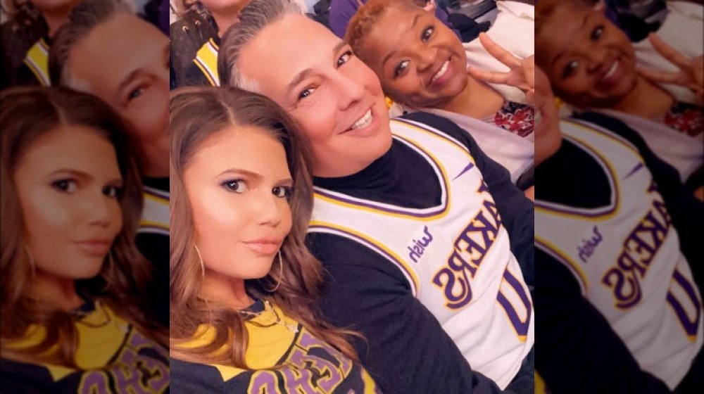 Chanel West Coast and family at a Lakers game