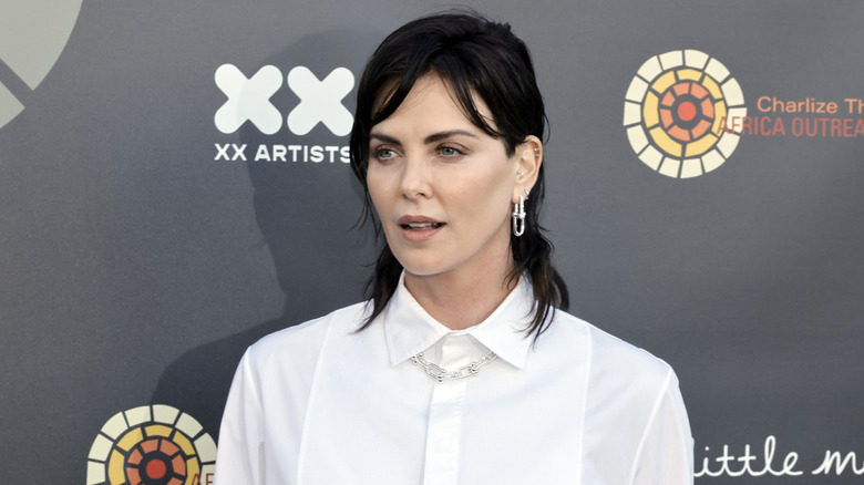 Charlize Theron with choppy black hair