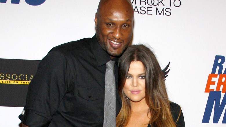 Khloe Kardashian and Lamar Odom smiling 