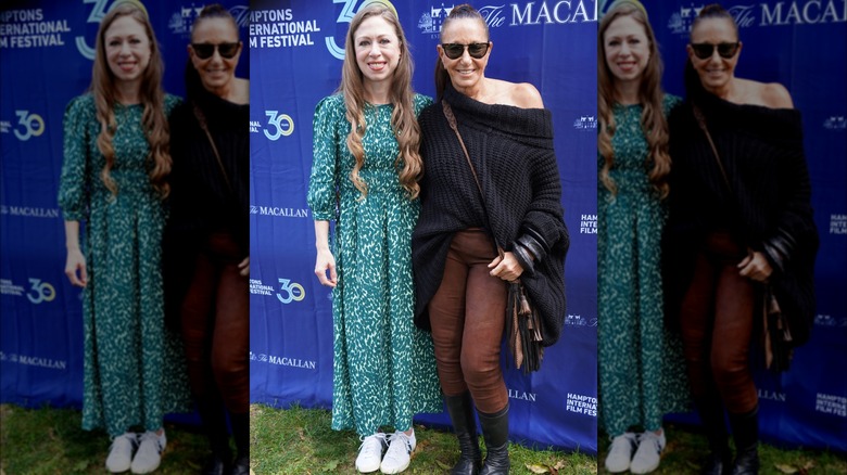 Chelsea Clinton posing with Donna Karan