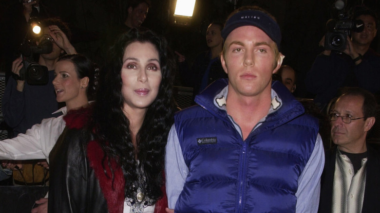 Cher standing with Elijah Blue Allman