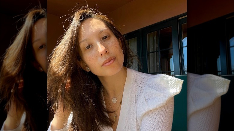 Cheryl Burke selfie in white shirt